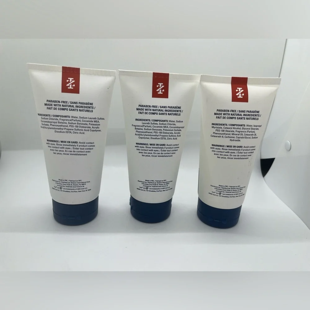 IZOD 4pc Kit Toiletry Set Travel Body Wash&Lotion,‎ Face Cleanser& Mesh Sponge.
